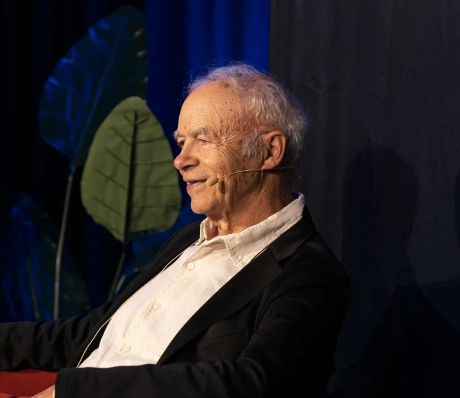 Peter Singer speaking on stage